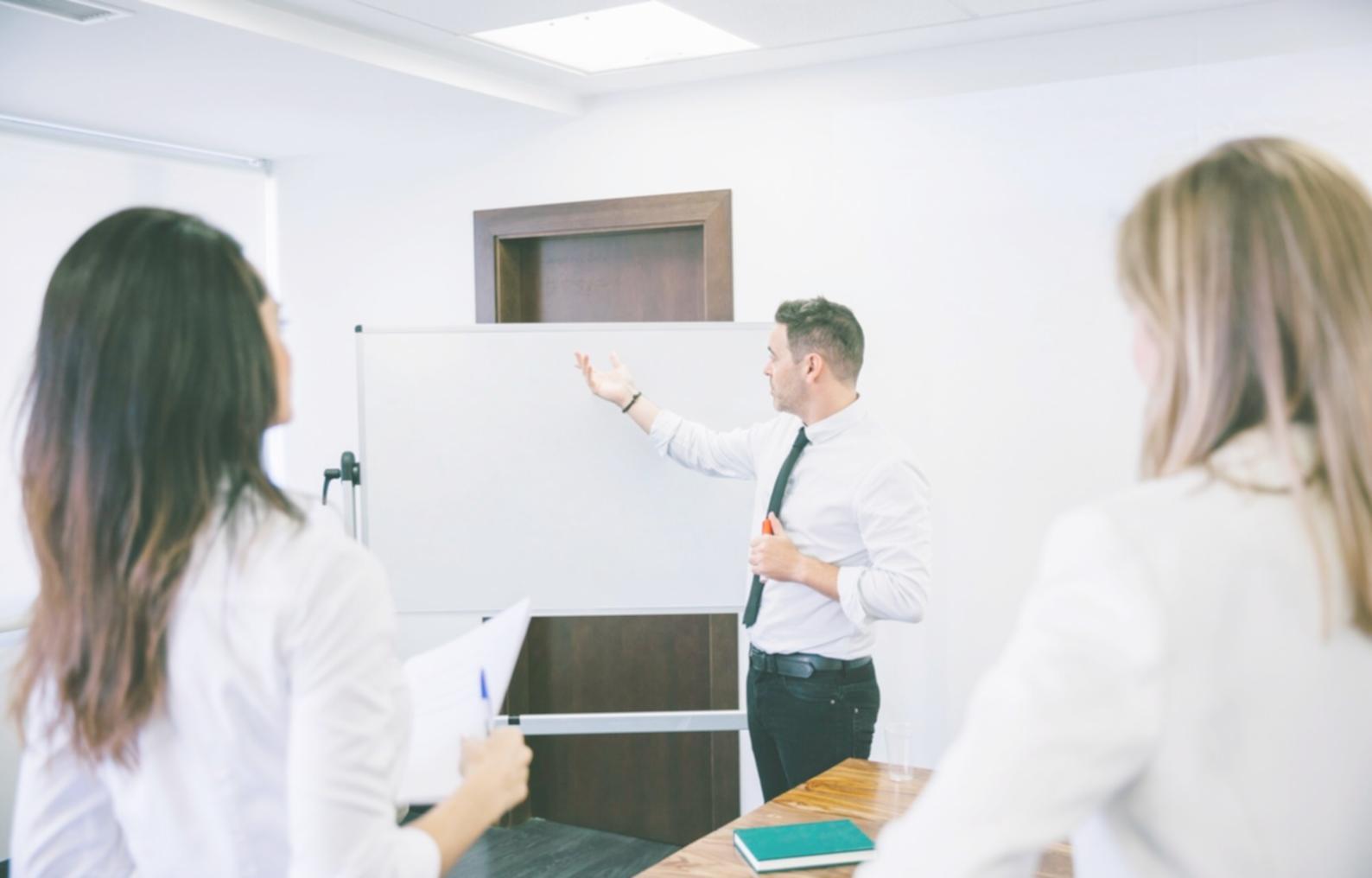 Community workshop participants discussing financial wellness strategies